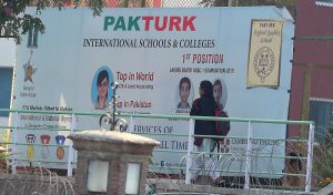 A Pakistani student walks at the private PakTurk International Schools and Colleges in Islamabad on November 16, 2016. Pakistan has ordered the deportation of 130 teachers affiliated with the alleged mastermind of an attempted coup in Turkey, officials said on November 15, as Turkish President Recep Tayyip Erdogan was to arrive for a visit. / AFP PHOTO / AAMIR QURESHI